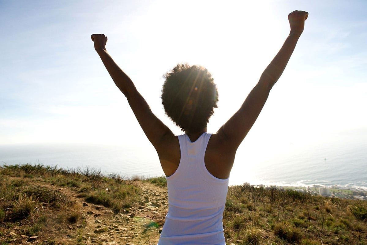 woman exercising free from pain from sports injuries